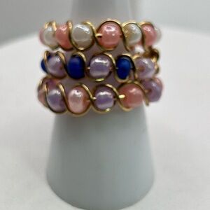 Stackable beaded rings.